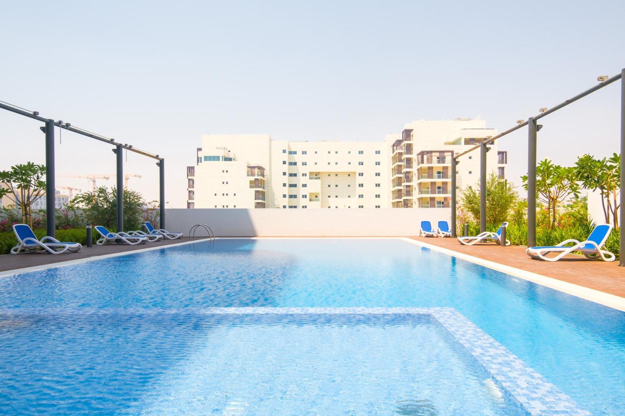 דירות אבו דאבי Poolside Charm מראה חיצוני תמונה
