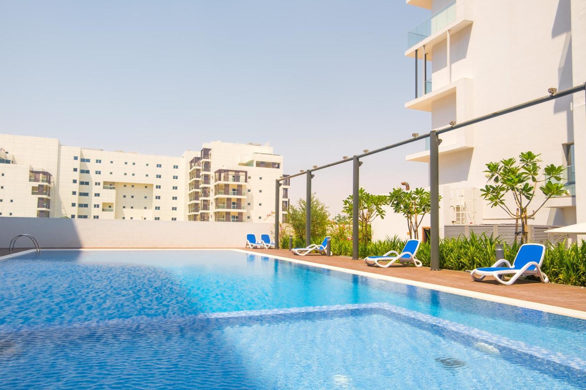 דירות אבו דאבי Poolside Charm מראה חיצוני תמונה